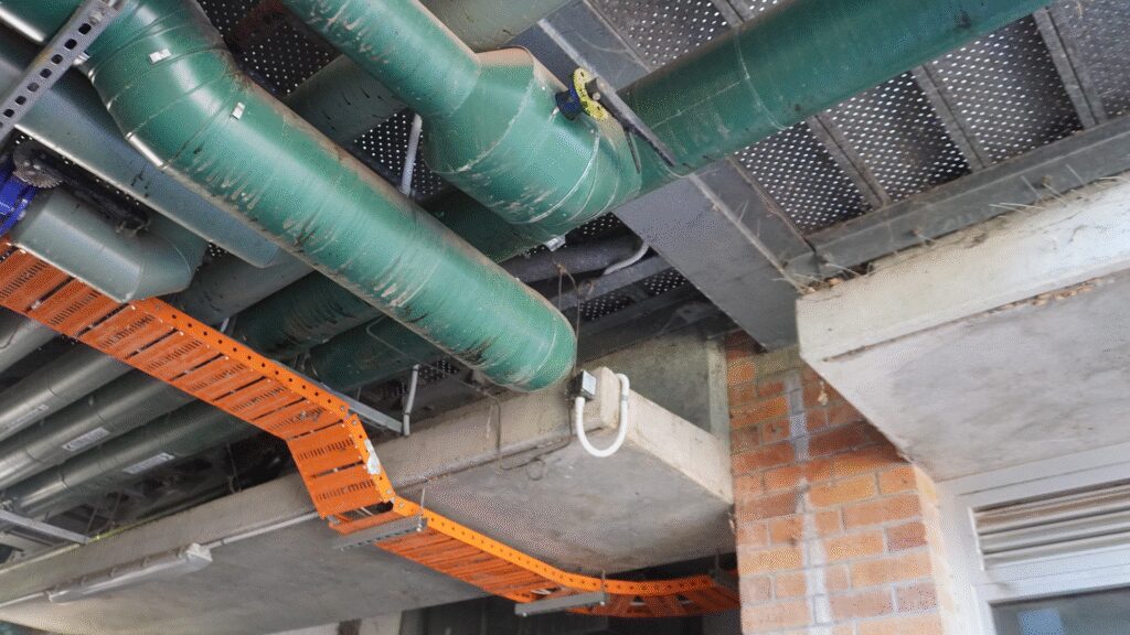 Forensic engineer reviewing structural condition assessment findings